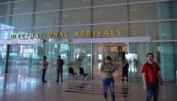 FILE – A photograph of the Islamabad airport shows travellers at the international arrival gate.