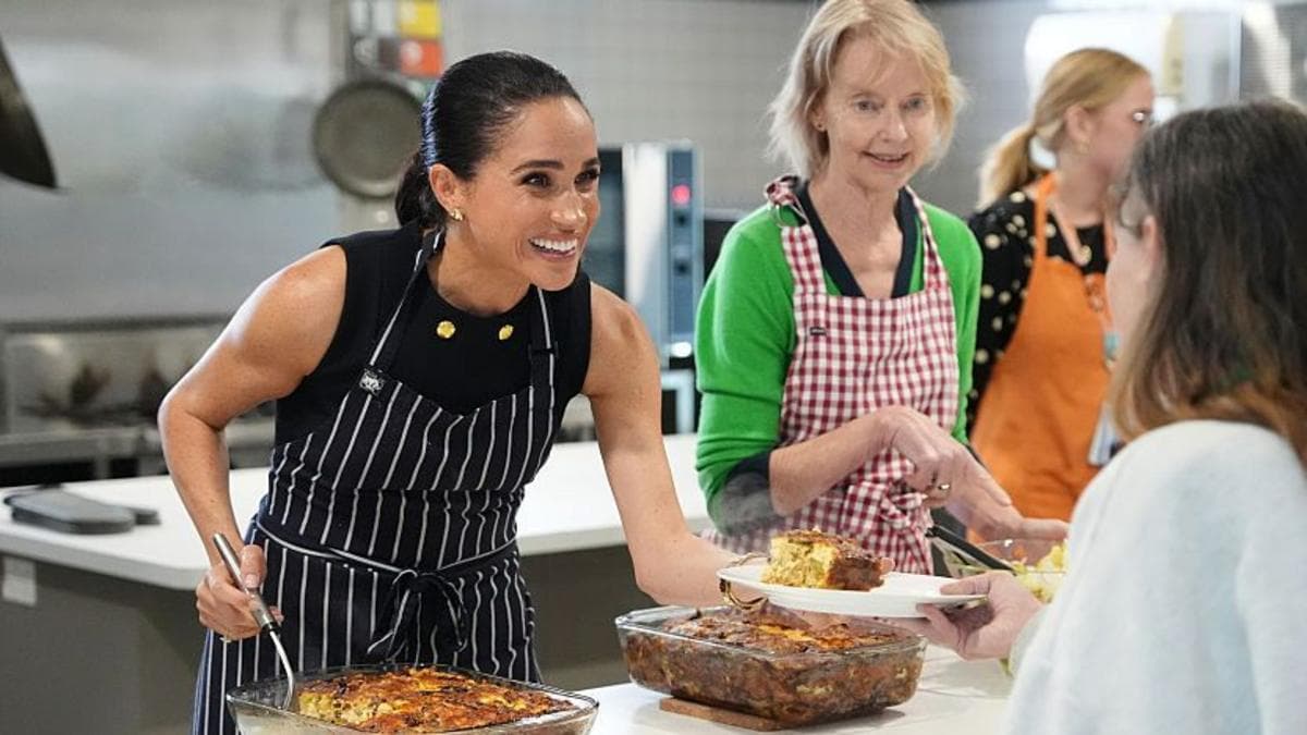 Image caption, Meghan pictured during an engagement on her last visit to Australia in April
