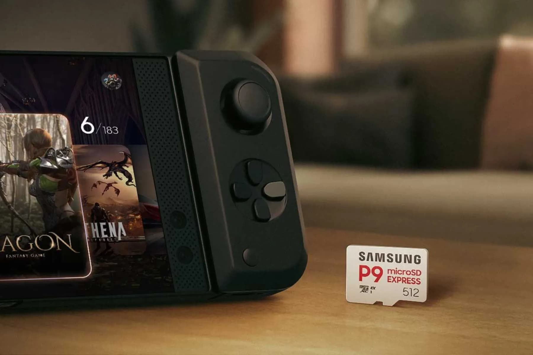 Samsung's P9 microSD Express card next to an Android phone with a controller attached.