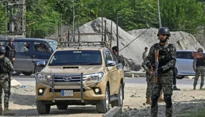 FILE – Security personnel stand guard in Bajaur district of Khyber Pakhtunkhwa.